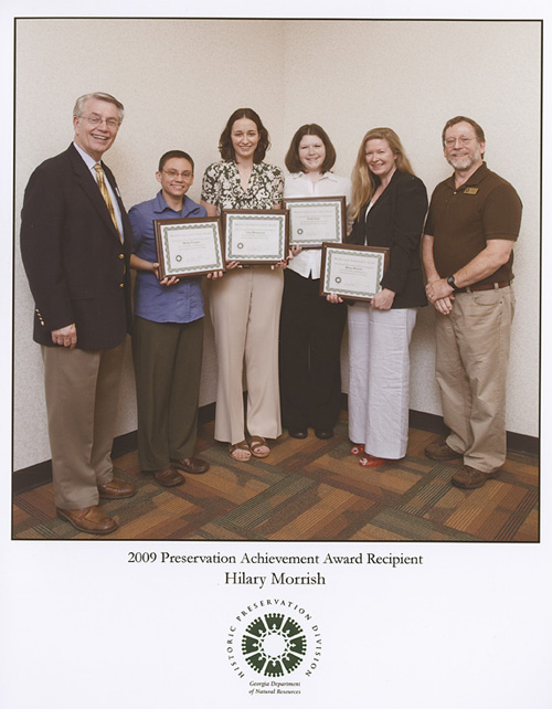 Hilary Morrish is the blonde woman, second from the right.