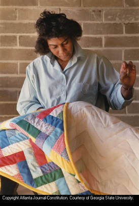 Lucy Abrams sewing a quilt as a member of the Freedom Quilting Bee, Alberta, Alabama, January 25, 1989. 