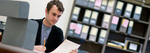 Student researching in the Special Collections reading room.