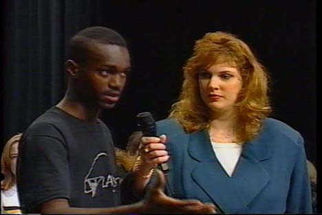 Audience member speaking during youth violence community forum