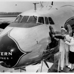A Constellation named Ponce de Leon is christened with a bottle of Coca-Cola at Hartsfield, 1951.