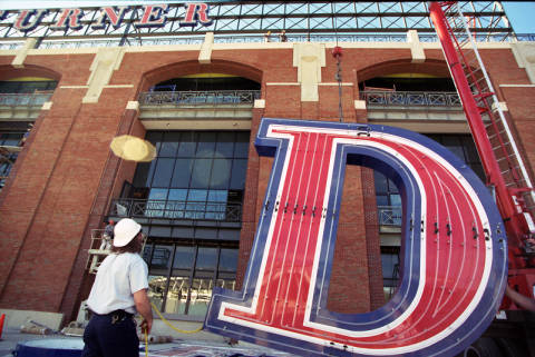 Installation of the Turner Field sign, March 1997