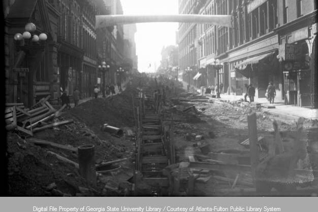 Excavation work on Alabama Street in 1927 in preparation for the street covering.