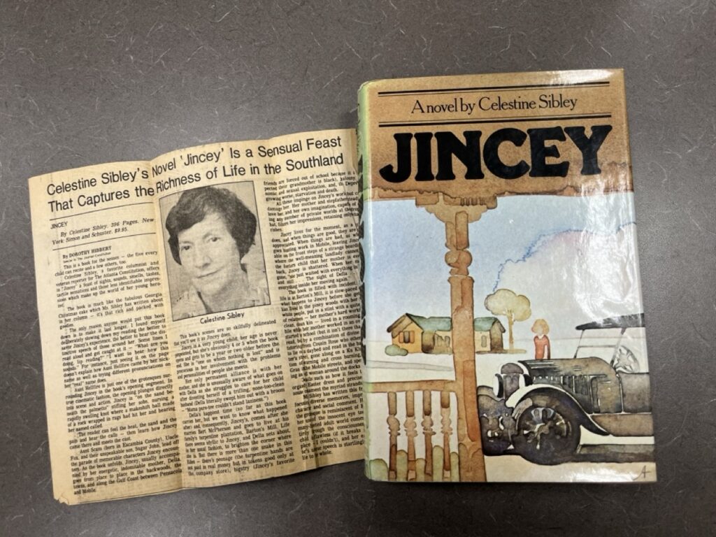 Newspaper clipping about author Celestine Sibley alongside the book "Jincey".